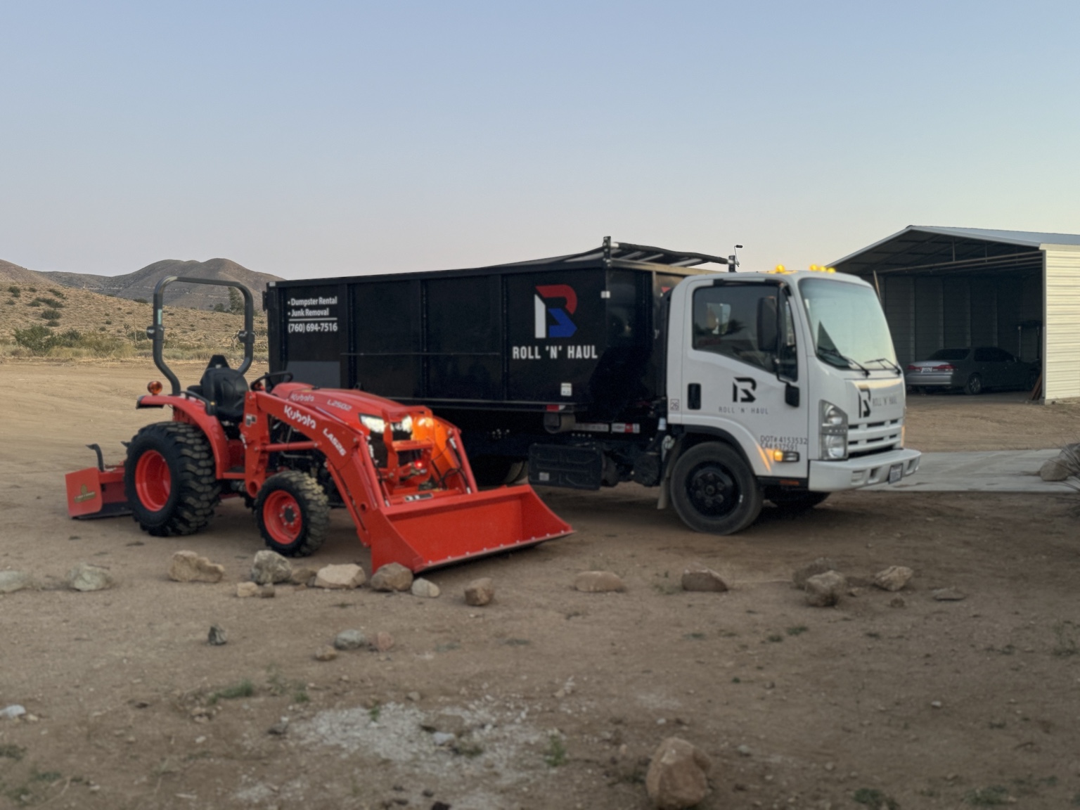 Roll N Haul truck, dumpster and Kubota tractor